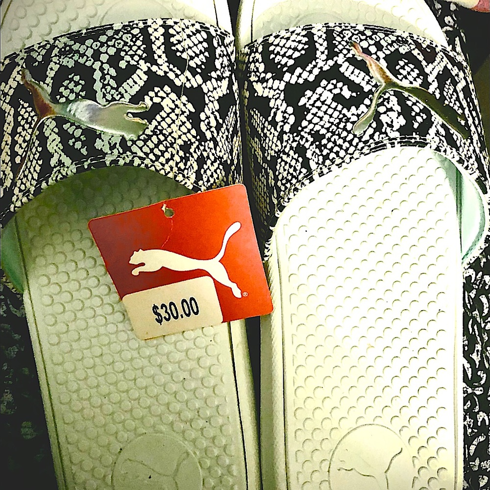 Woman’s puma sandal slides size 10new with tags $30